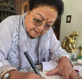 प्रधानमन्त्री दैवी प्रकोप उद्धार कोषमा ८७ बर्षिय  राजी राणाले एक करोड ९ लाख सहयोग